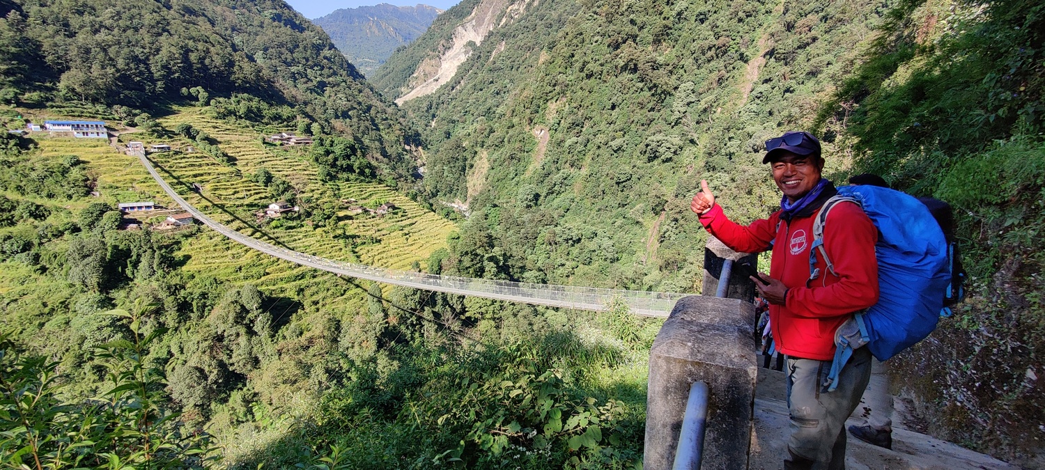 The Kadoorie bridge with smiling Raj, our assistant guide